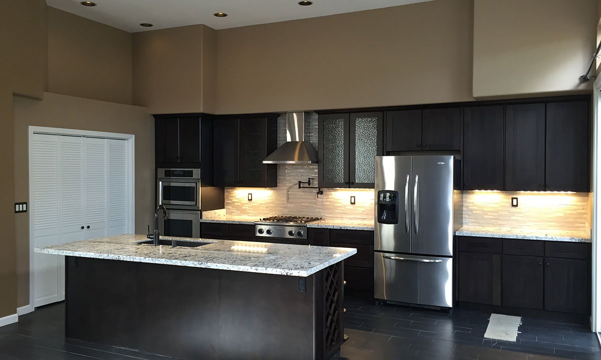 Dark cabinet kitchen remodel with island