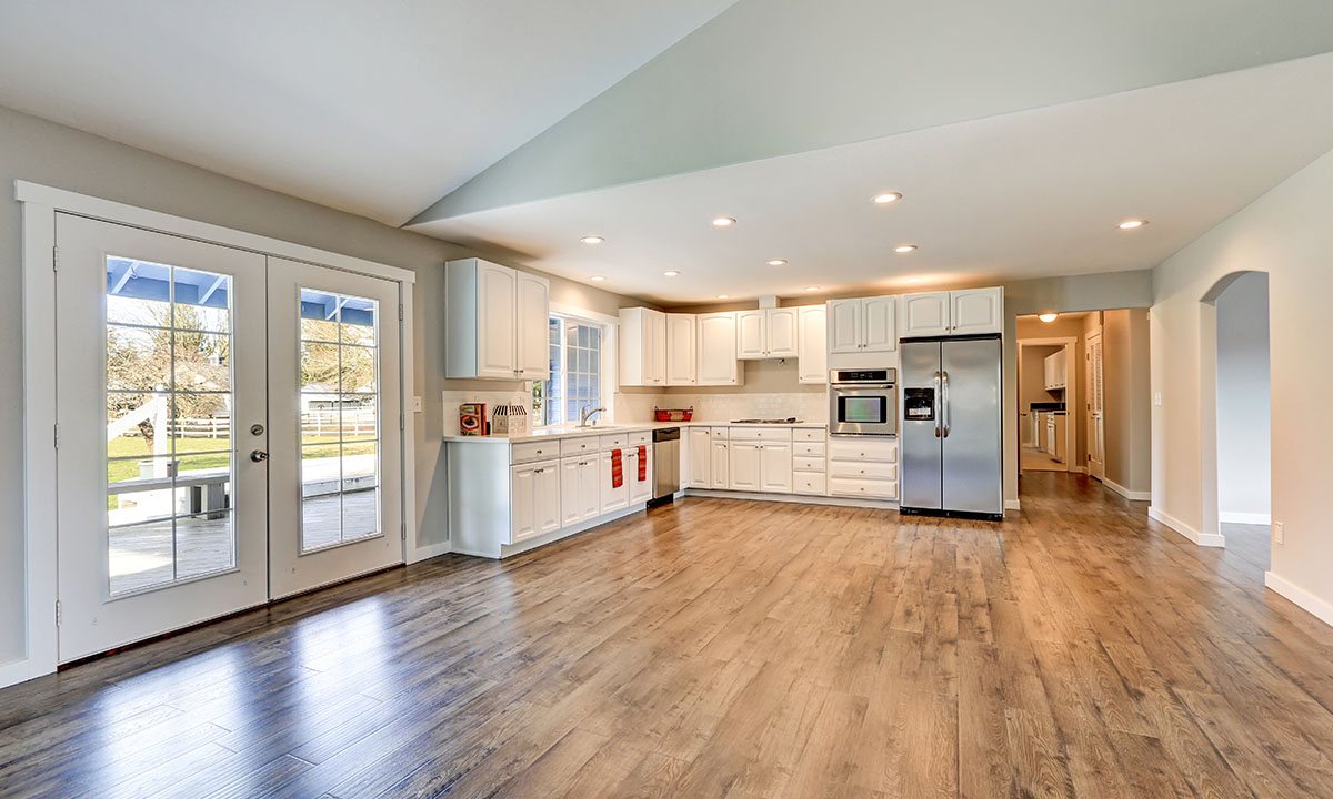 Open plan living and kitchen with hardwood floors